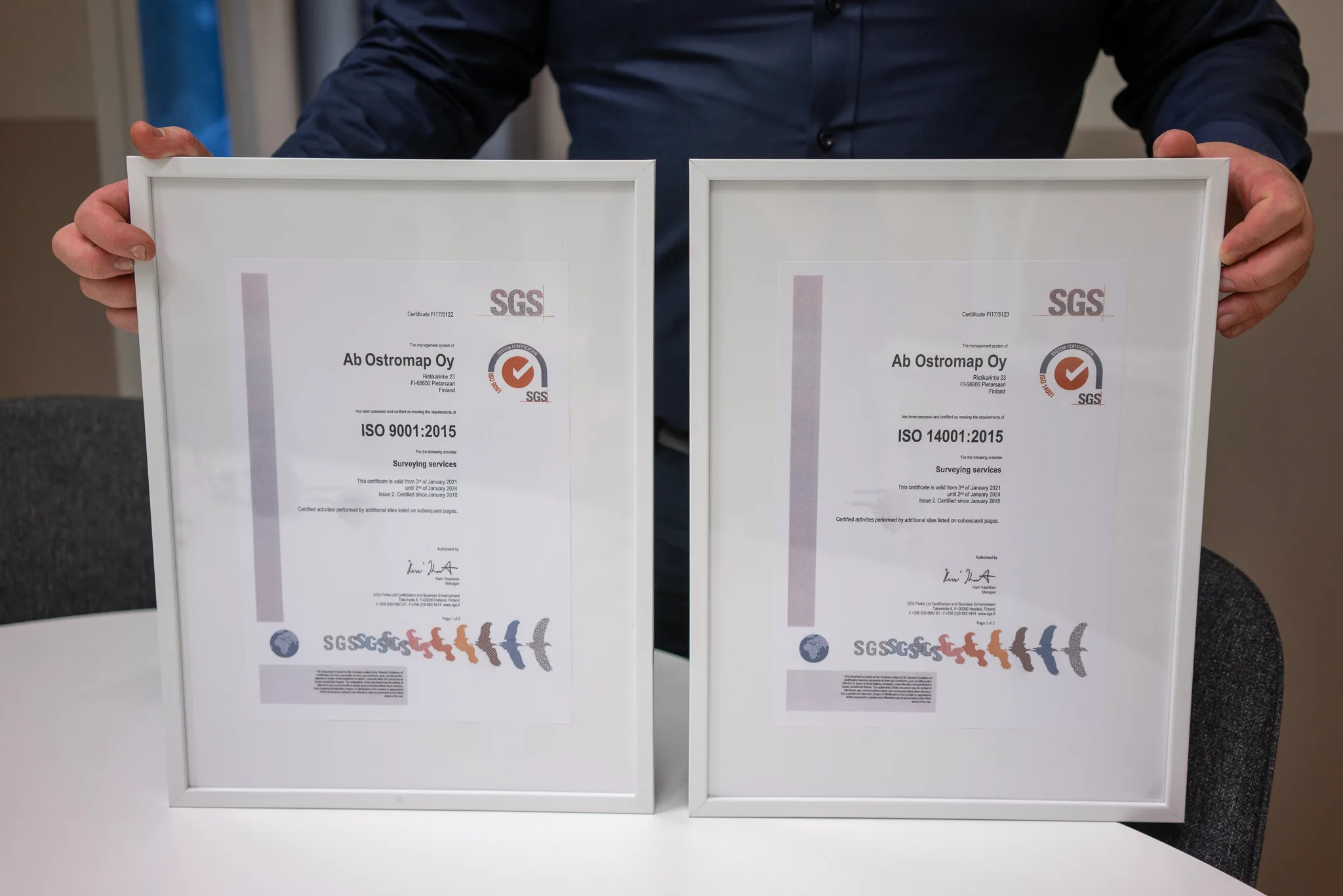 Ostromaps ISO 9001- och ISO 14001-certifikat från SGS